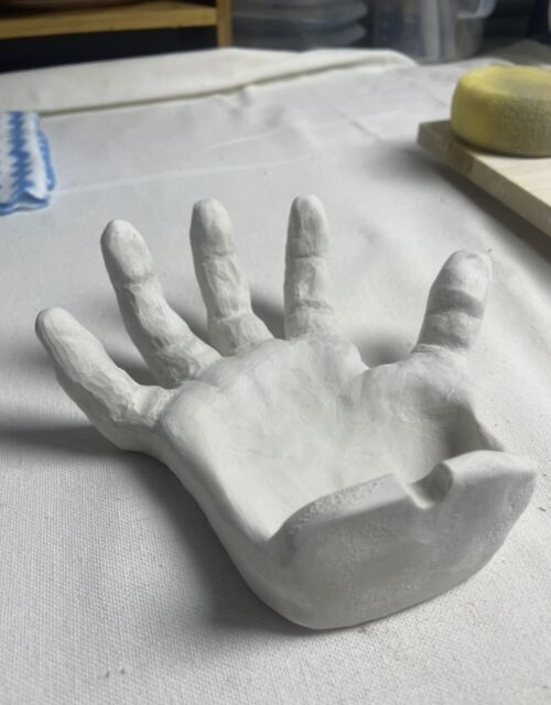 handmade ceramic mug in neutral glaze high-fired pottery bowl studio shot ceramic plate natural light photography