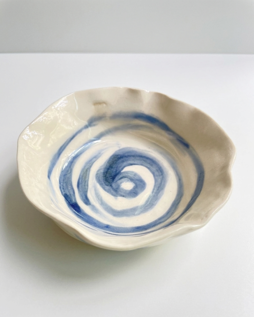 Handbuilt underglaze decorated fluted small bowl