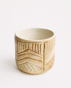 Handbuilt carved cylindrical form ceramic teacup