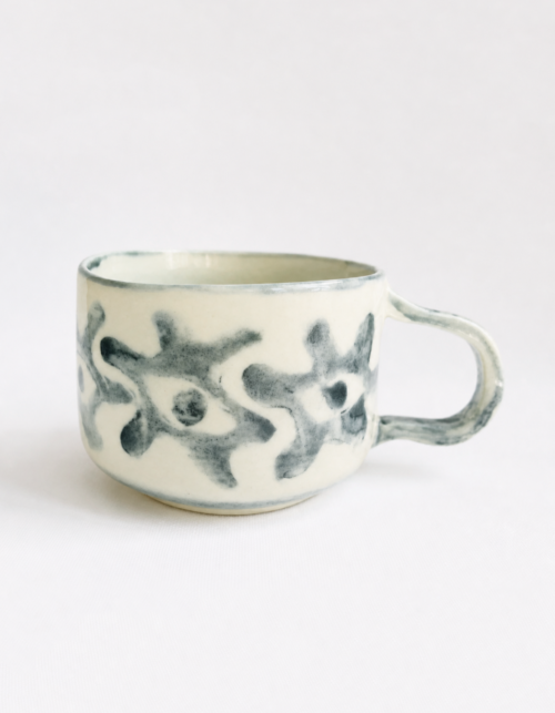Handbuilt underglaze decorated mug