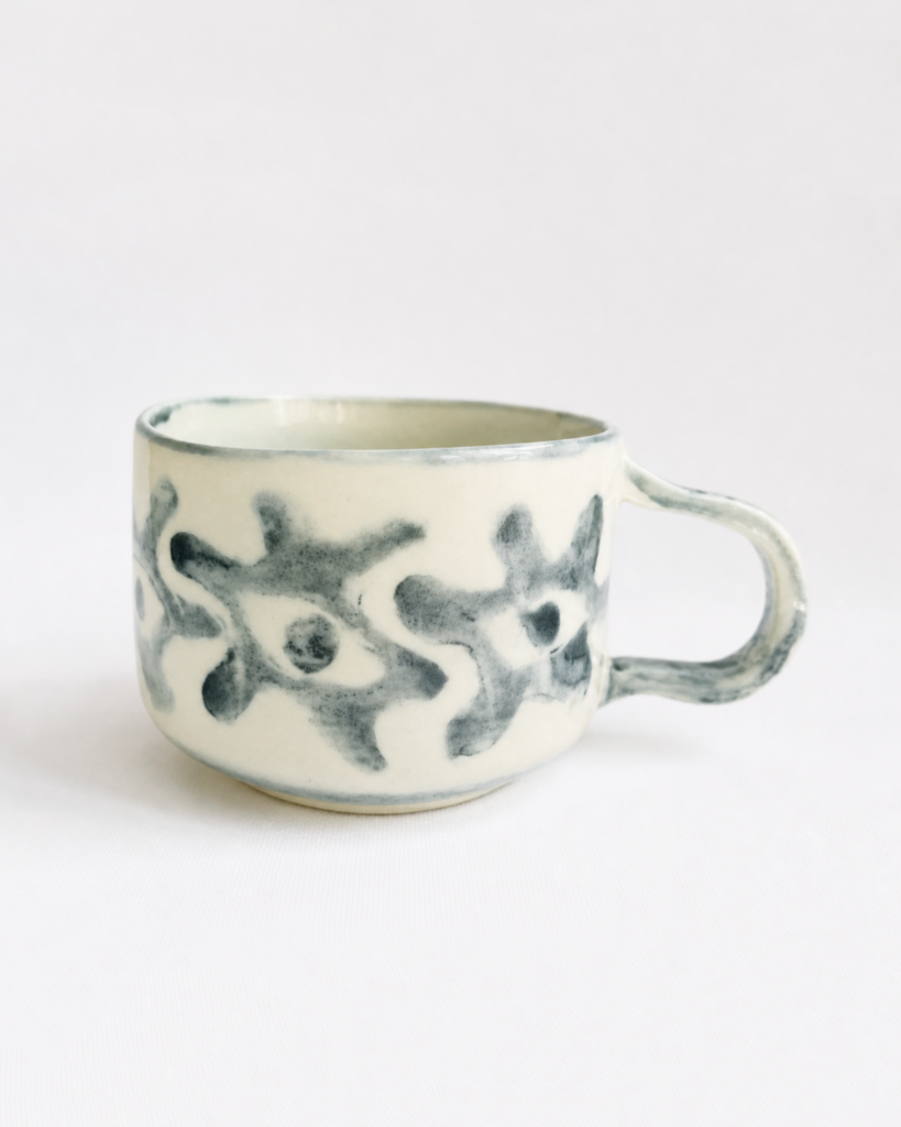 Handbuilt underglaze decorated mug