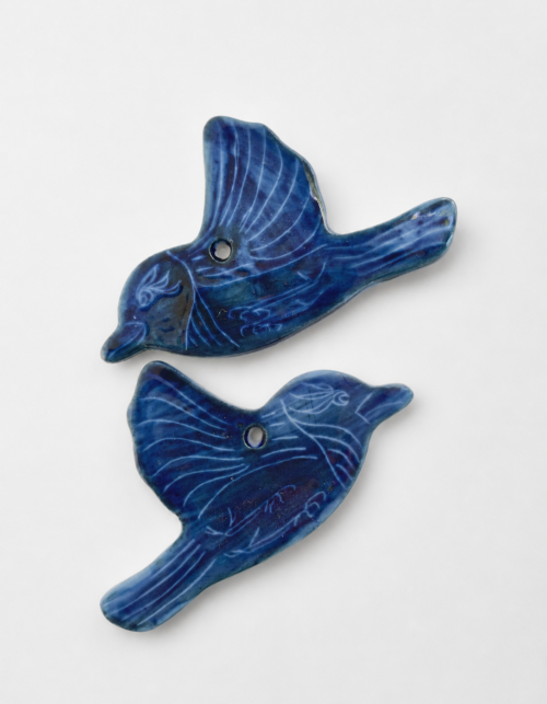 Swallow shaped ceramic hanging piece, decorative object form